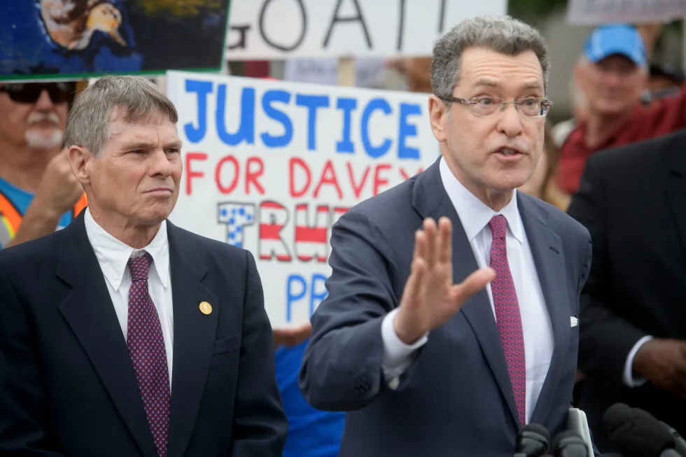Ex-Olympian denies damaging Washington memorial pool